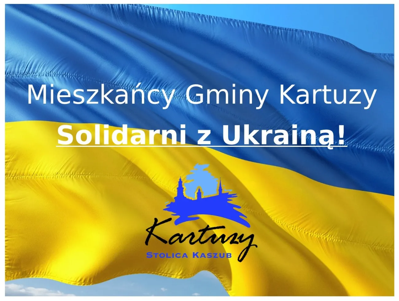 Flaga Ukrainy i napis "Mieszkańcy Gminy Kartuzy Solidarni z Ukrainą!". Logo Kartuz